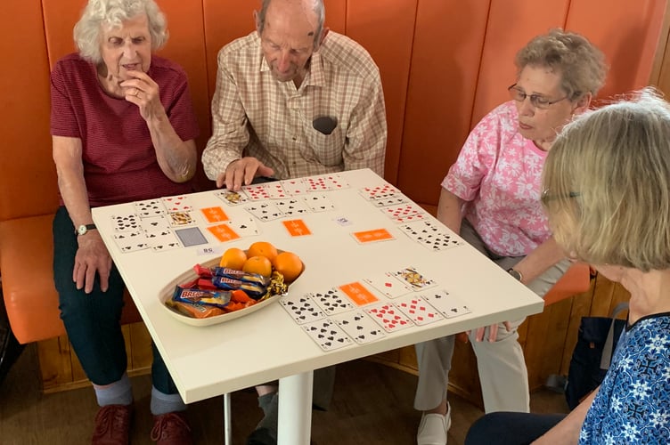 Oddfellows take part in card bingo.