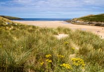 RNLI lifeguards at Crantock rescue two beachgoers