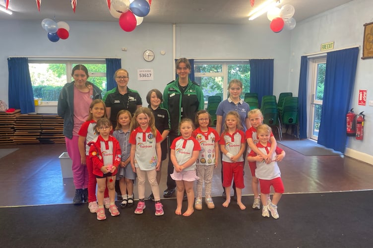 The 1st Liskeard Rainbows pose for a picture after a session with Liskeard branch of St John Ambulance