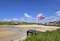 Emergency services called after swimmer pulled from the water