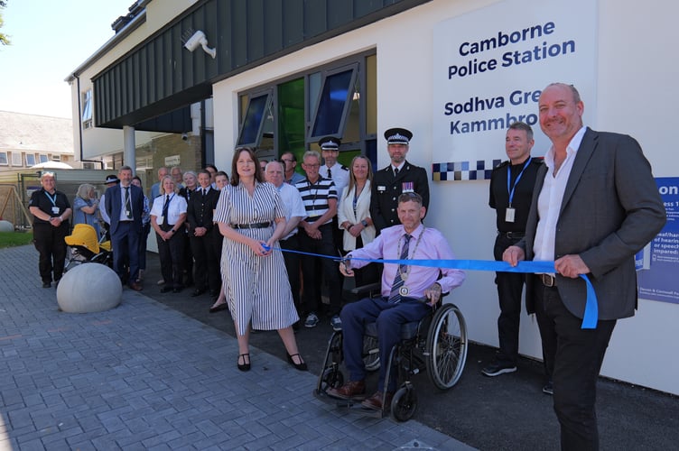 Commissioner Alison Hernandez and MP Perran Moon hold the ribbon which was cut by Camborne Mayor Cllr James Ball.