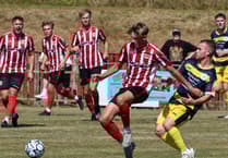 Deacon’s hat-trick ends St Austell’s resistance