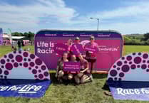 Team manages not to come unstuck in muddy charity challenge