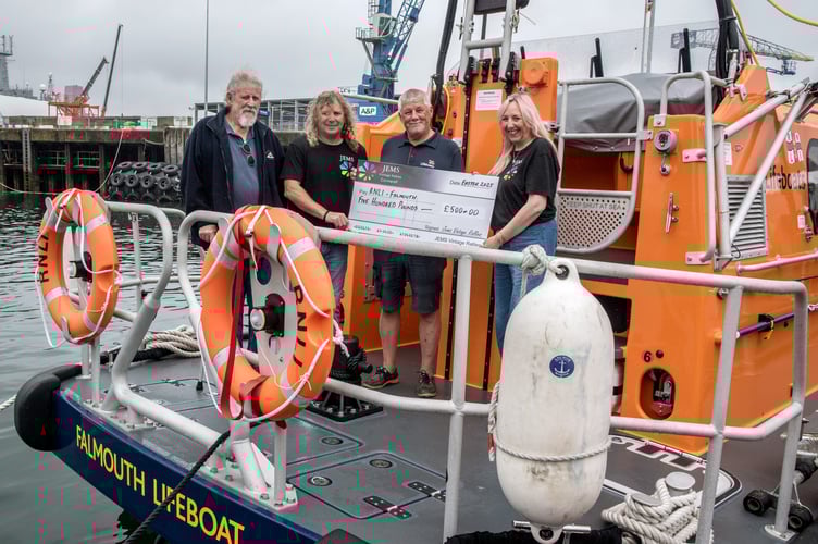 Left to right: Mick French, Jason Goss, Senior Station Technician Jon Blakeston and Emma Goss on board the Shannon class all-weather lifeboat Decibel Too.