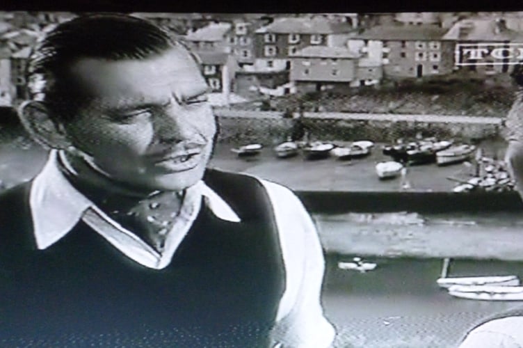 Barrie says of this photograph: “Here is a shot taken from Polkirt Hill Mevegissey when the film , Never Let Me Go was shot in 1953. It was adapted from the novel "Came the Dawn". Among the many stars were Clark Gable, Gene Tierney, Kenneth Moore, Bernard Miles and others. The main film was shot at Mevagissey and Newguay, by MGM Studios. One scene showed a car being driven off the end of the pier into the Harbour.”