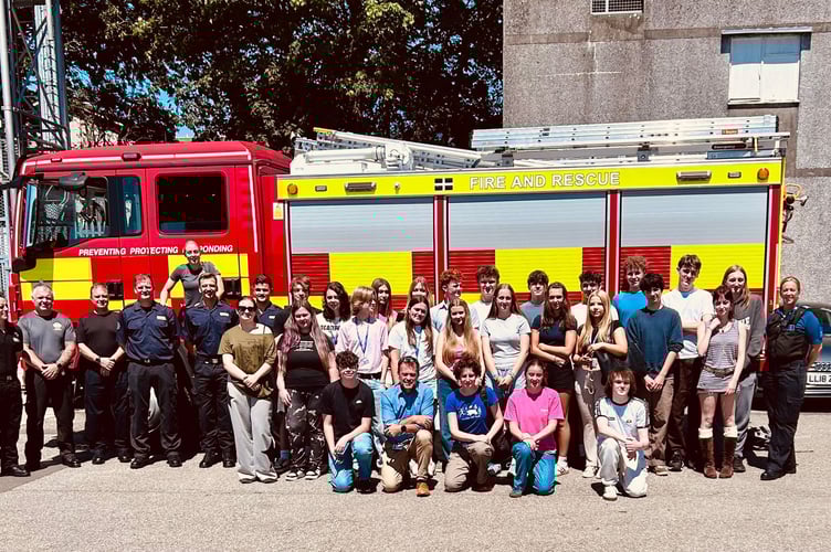 Students pose with members of the emergency services during the recent demonstration held at Liskeard Fire Station
