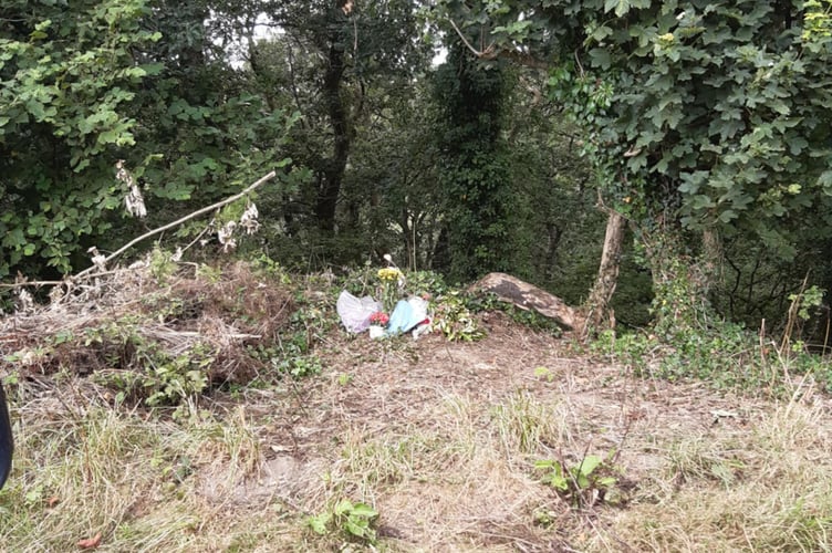 The site where Lee Hockey was found, marked with flowers