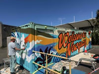 Colourful mural created to welcome people to the town