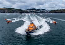 Lifeboat makes spectacular departure from Fowey accompanied by flotilla