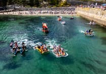 Crowds line shore to watch madcap raft race in Charlestown