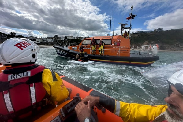 Two people were rescued from a drifting inflatable boat off Gorran Haven. Picture: Fowey RNLI