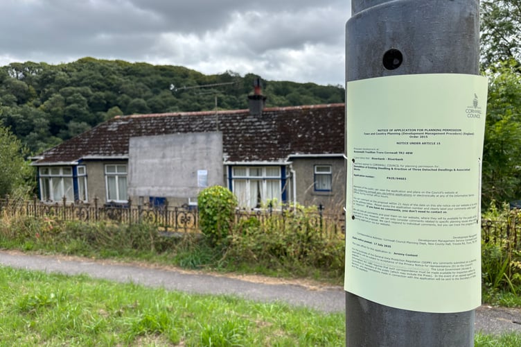The planning notice for the contentious proposal to replace the riverside bungalow with three houses.