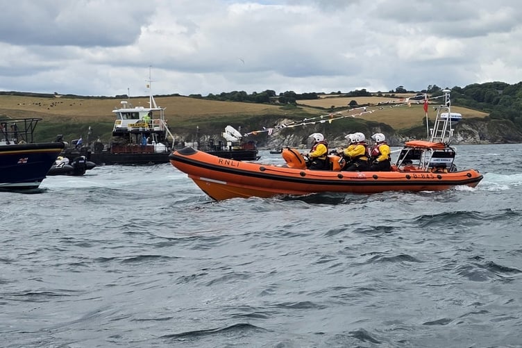 The Fowey Atlantic 85 lifeboat taking part in the farewell flotilla. (Picture: Fowey RNLI)