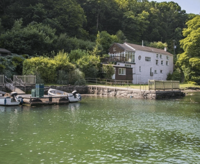 Riverfront estate with rock history and private studio up for sale