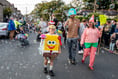 Thousands watch village carnival parade