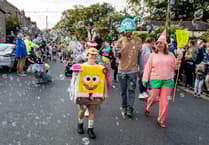 Thousands watch and cheer Charlestown's colourful carnival parade
