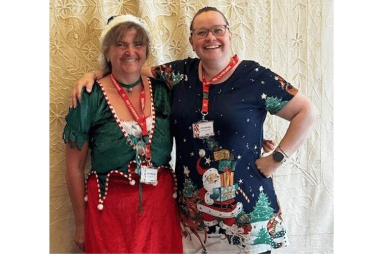 BID Camborne director Jo Weller and BID Camborne Chair Samantha Hussey dress up for a summer Christmas meeting.