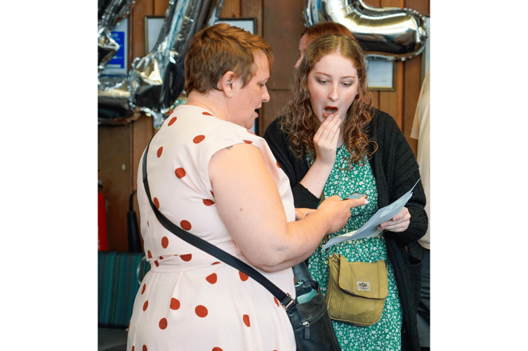 Laughter and relief as envelopes are opened after two years of study.