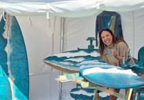 Ocean-infused surfboard artwork being auctioned for charity