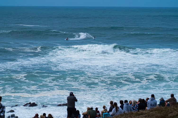 Spectators lined Towan Headland to watch the big wave spectacle (Picture: Josh Curtis)
