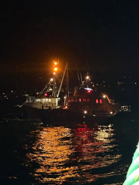Penlee lifeboat alongside the fishing vessel.