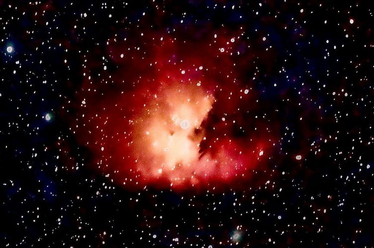 A photographer captured a stunning picture of the 'Pacman Nebula'.Jade Warner, 40, took the image of NGC 281 using a Dwarf Lab Three telescope.It took her four hours to take 243 images and she then stacked those images to get a clearer picture.Known as the Pacman Nebula for its resemblance to the video game character it is a bright emission nebula.
