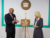 Queen visits disaster relief charity to mark its 25th anniversary