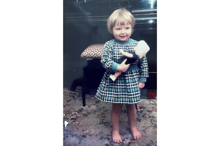Sue Adams with one of her dollies.