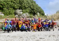 Nearly 400 swimmers take part in country’s 'friendliest swim'