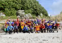 Nearly 400 swimmers take part in country’s 'friendliest swim'