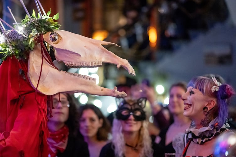 A reveller smiles at Penglas, meaning ‘grey head’, at Golowan, a midsummer festival revived in Penzance