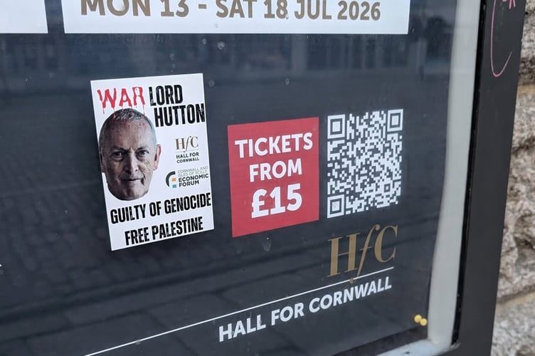 A poster concerning Lord Hutton was stuck outside the Hall for Cornwall by activists 