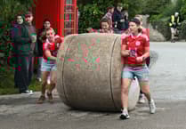 Fundraisers roll up to take part in 25th bale push despite the wet weather