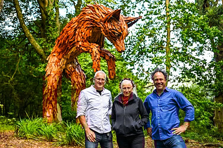 Pete Hill, Sue Hill and Hal Silvester with the leaping fox. (Picture: Hugh Hastings)