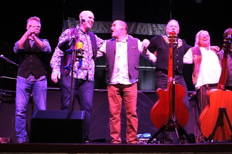 Countrymen at the theatre.