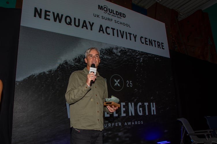 Rob Barber, owner of Newquay Activity Centre, accepting the best surf award