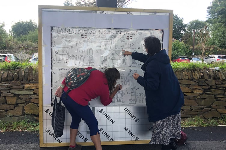 Adults and children joined Dandy & Beano cartoonist Nick Brennan to create a giant community drawing of Liskeard’s buildings