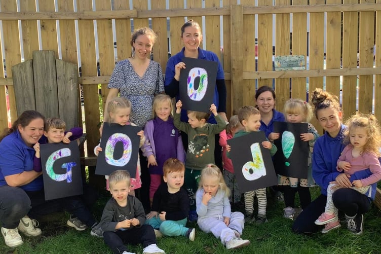 Staff and children at Happy Days Nursery Penrice in St Austell celebrate the 'good' rating.