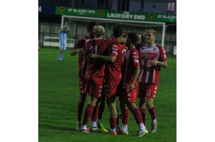 Newquay celebrate a goal at St Blazey.