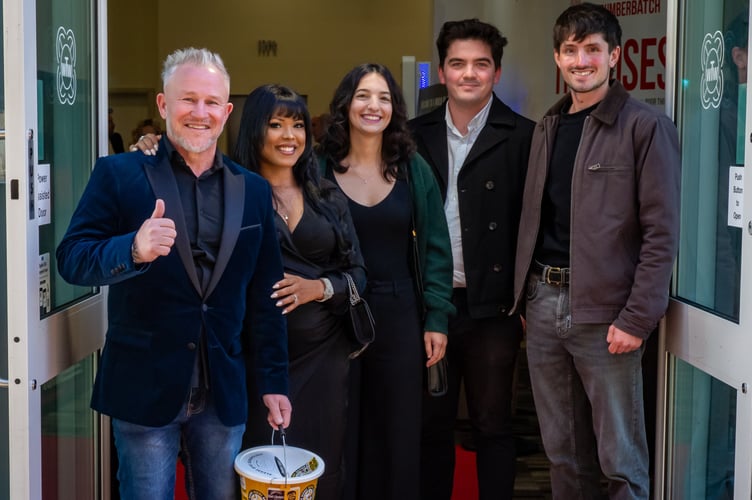 OLYMPUS DIGITAL CAMERA Clint Osborne (left) and director Remi Cribb (2nd right) plus family and friends. 