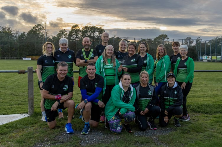 members of Hayle Runners with their
award.