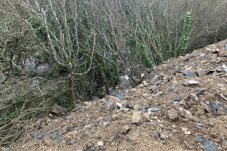 Asbestos tiles tipped and entering watercourse