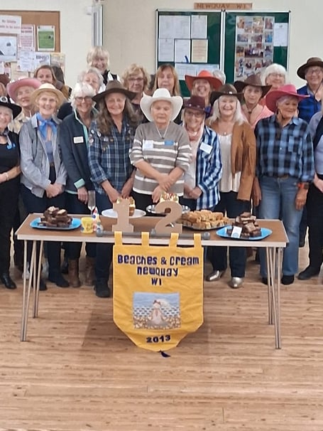 Members celebrating Peaches & Cream WI's 12th birthday