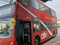 Bus clips hospital canopy at Royal Cornwall Hospital
