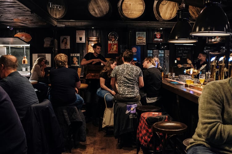 Generic bar or pub scene with people drinking