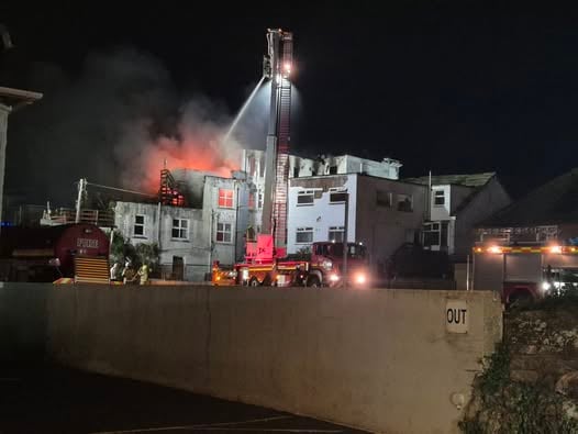Fire crews battling blaze at derelict hotel