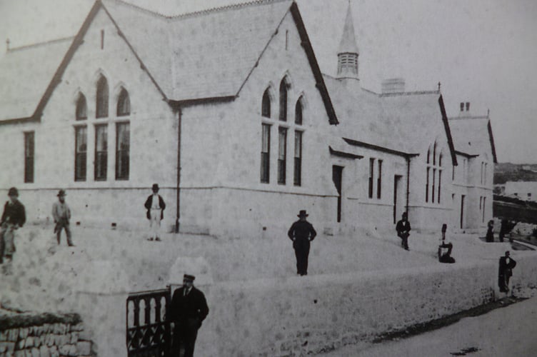 Barrie says of this photograph: “Built in 1880, the headmaster’s house can be seen at the far end. It was the elementary school that A L Rowse attended from 1908 to 1914 before he attended the county school. Now subject to conversion following a fire some years ago.”