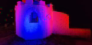 Iconic building illuminated to highlight awareness 