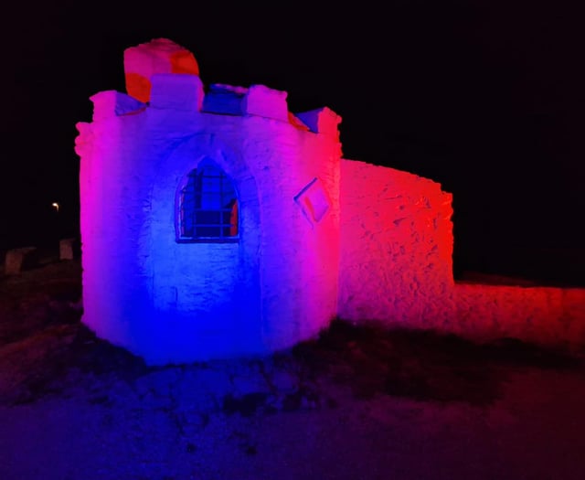 Iconic building illuminated to highlight awareness 