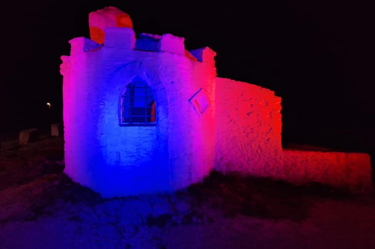 The Huer's Hut was illuminated pink and blue to highlight baby loss awareness week (Picture: Newquay Lions)
